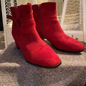 Women’s suede cranberry/wine boots.